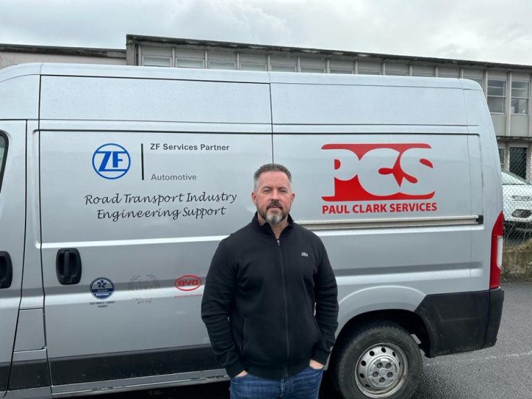 Paul Clark standing in front of Paul Clark Services van.